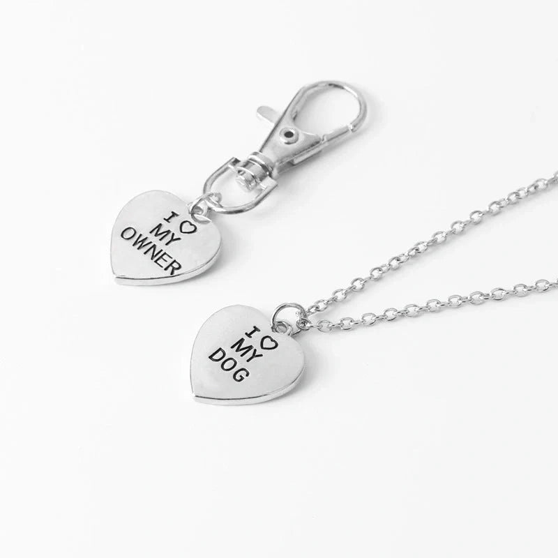 Stylish dog bone necklace for pet lovers, available in silver and gold.