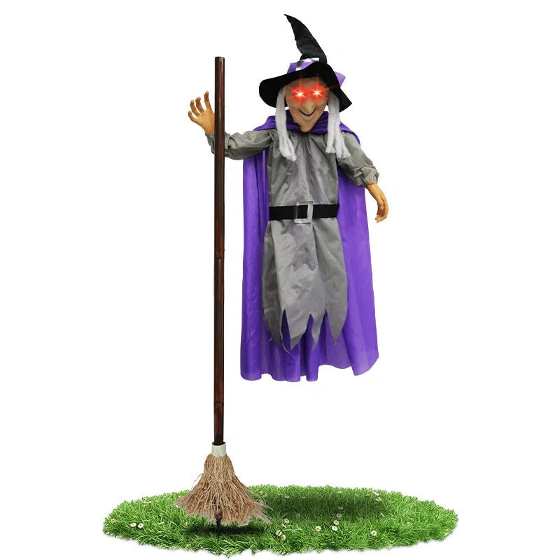Floating witch Halloween decoration with broom, lifelike scary face, and purple hovering skirt