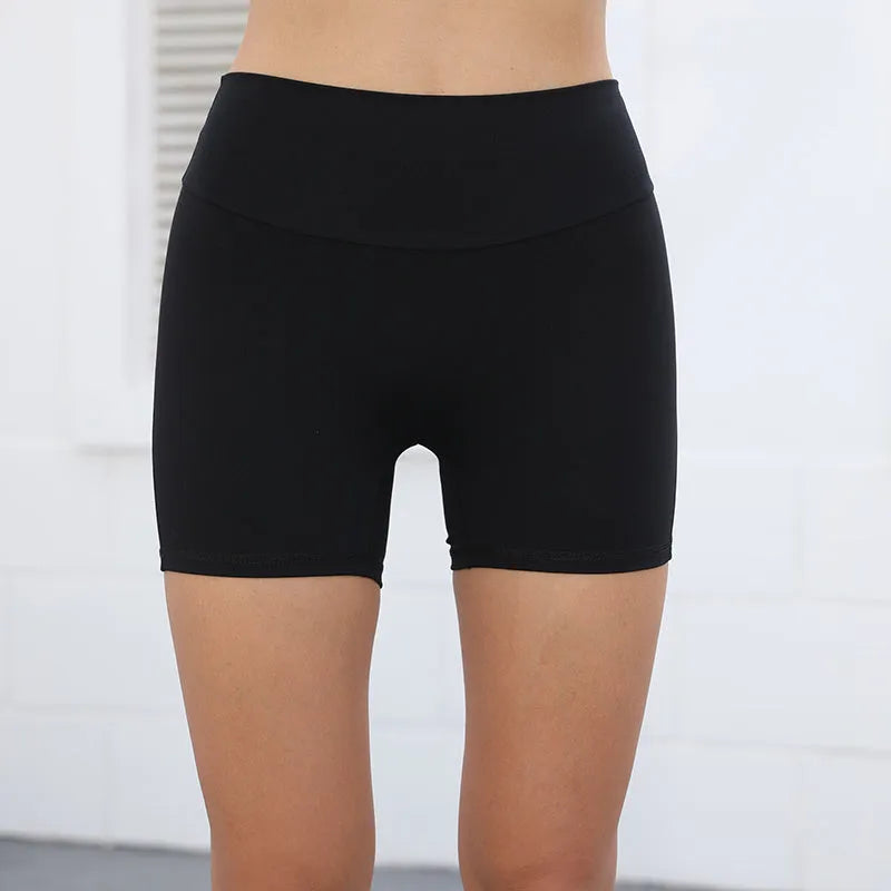 Women's high-waist quick-dry fitness shorts with side pockets in avocado green colour