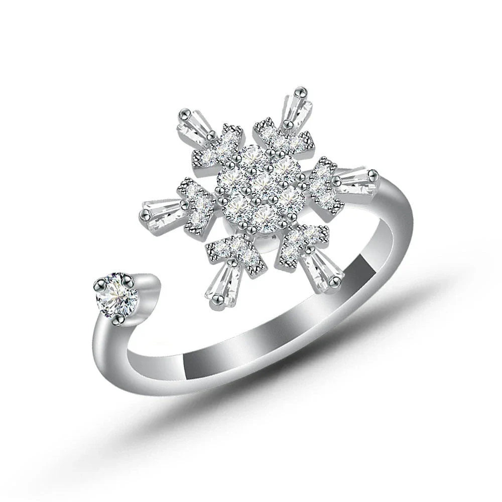 Adjustable spinner ring with rotating floral, geometric, and nature-inspired motifs for women's fashion and stress relief