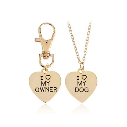 Stylish dog bone necklace for pet lovers, available in silver and gold.