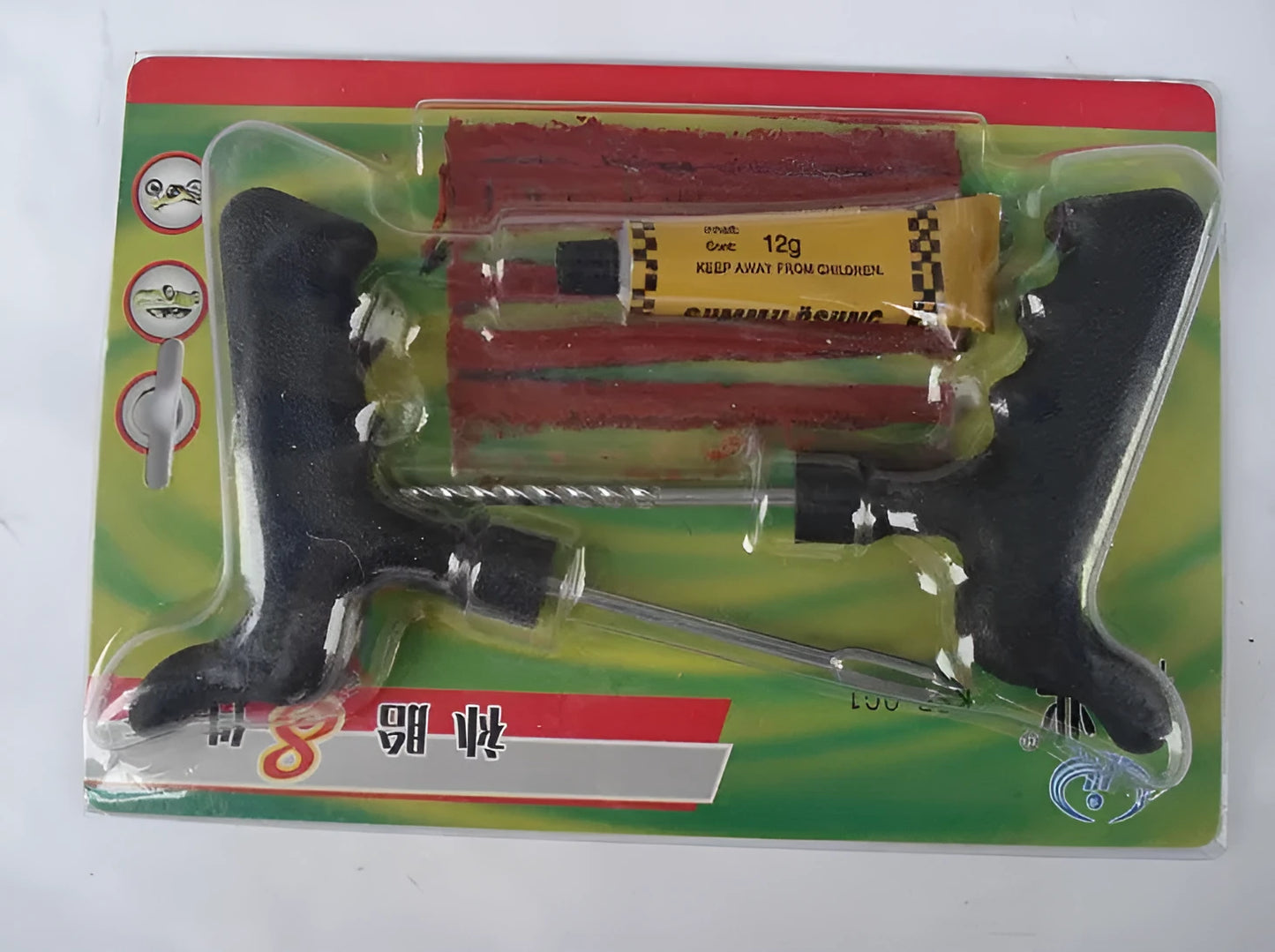 Eight-piece vacuum tire repair tool kit with rubber strips, glue, probe, and pin on black plastic packaging.