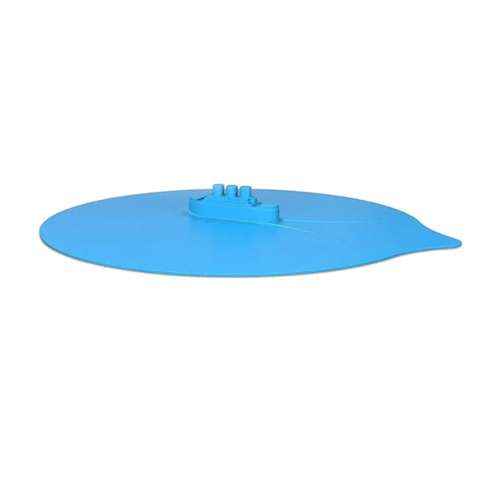 Blue silicone steamer lid on kitchen bowl showing airtight seal and flexible edges