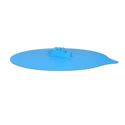 Blue silicone steamer lid on kitchen bowl showing airtight seal and flexible edges