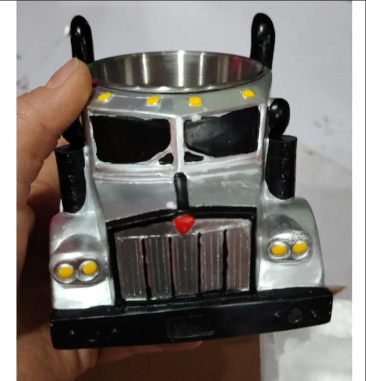Resin semi-truck shaped coffee mug in orange colour with 11-ounce capacity