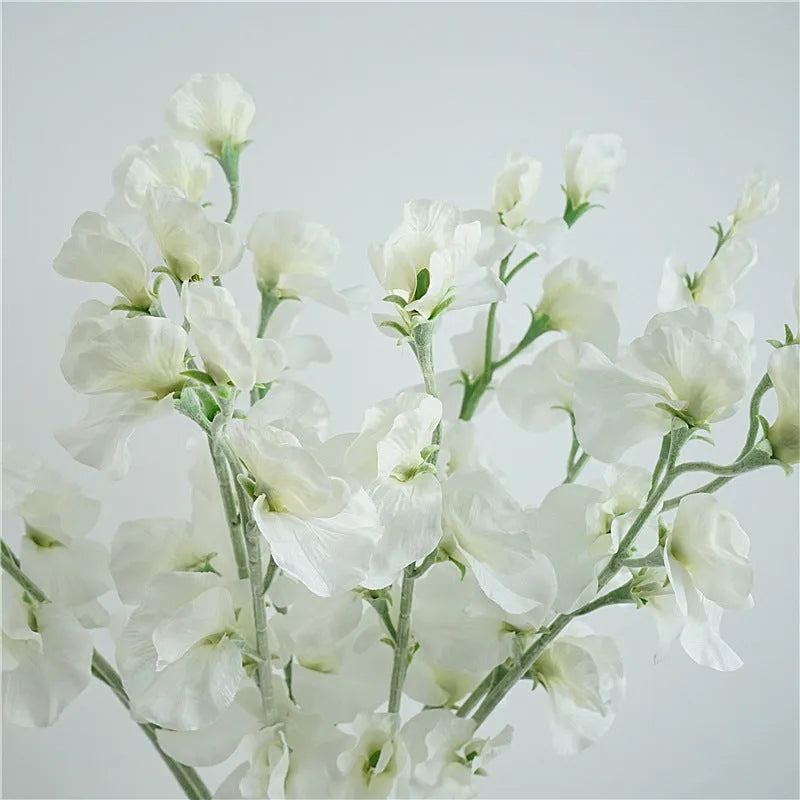 Artificial silk pea flower single stem in pink, purple, red, or white colours measuring 40cm height