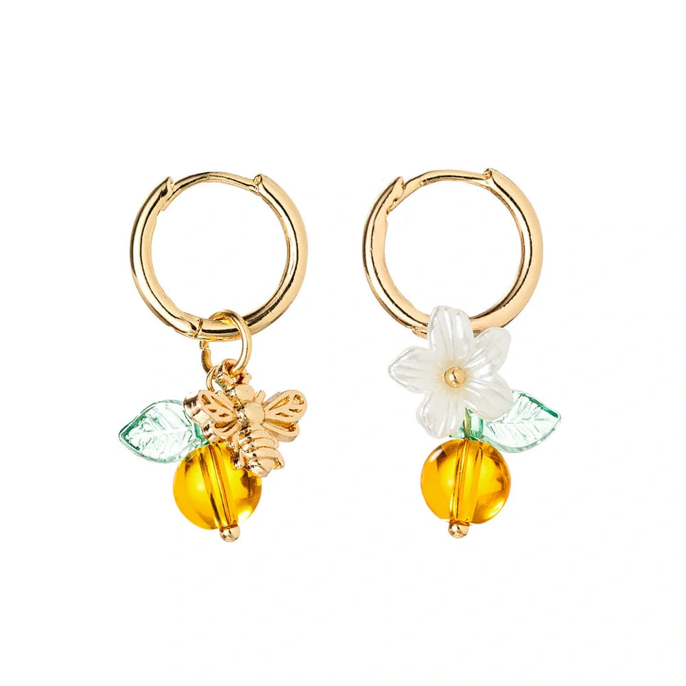 Adjustable women's ear cuffs with bee-shaped pendant, glass leaves, and floral elements in XY-123 colour