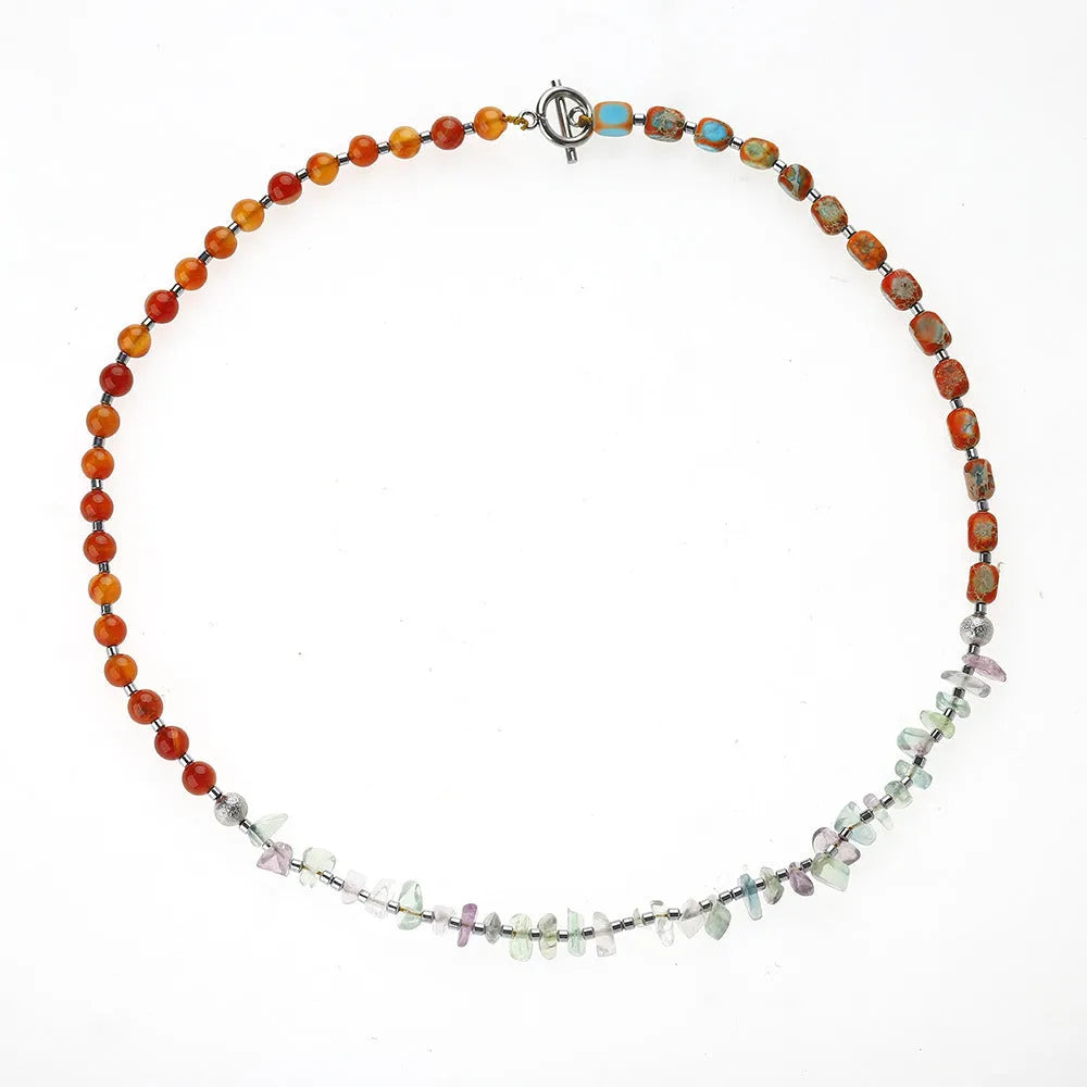 Hand-woven red agate round beads bracelet with geometric shapes and texture design