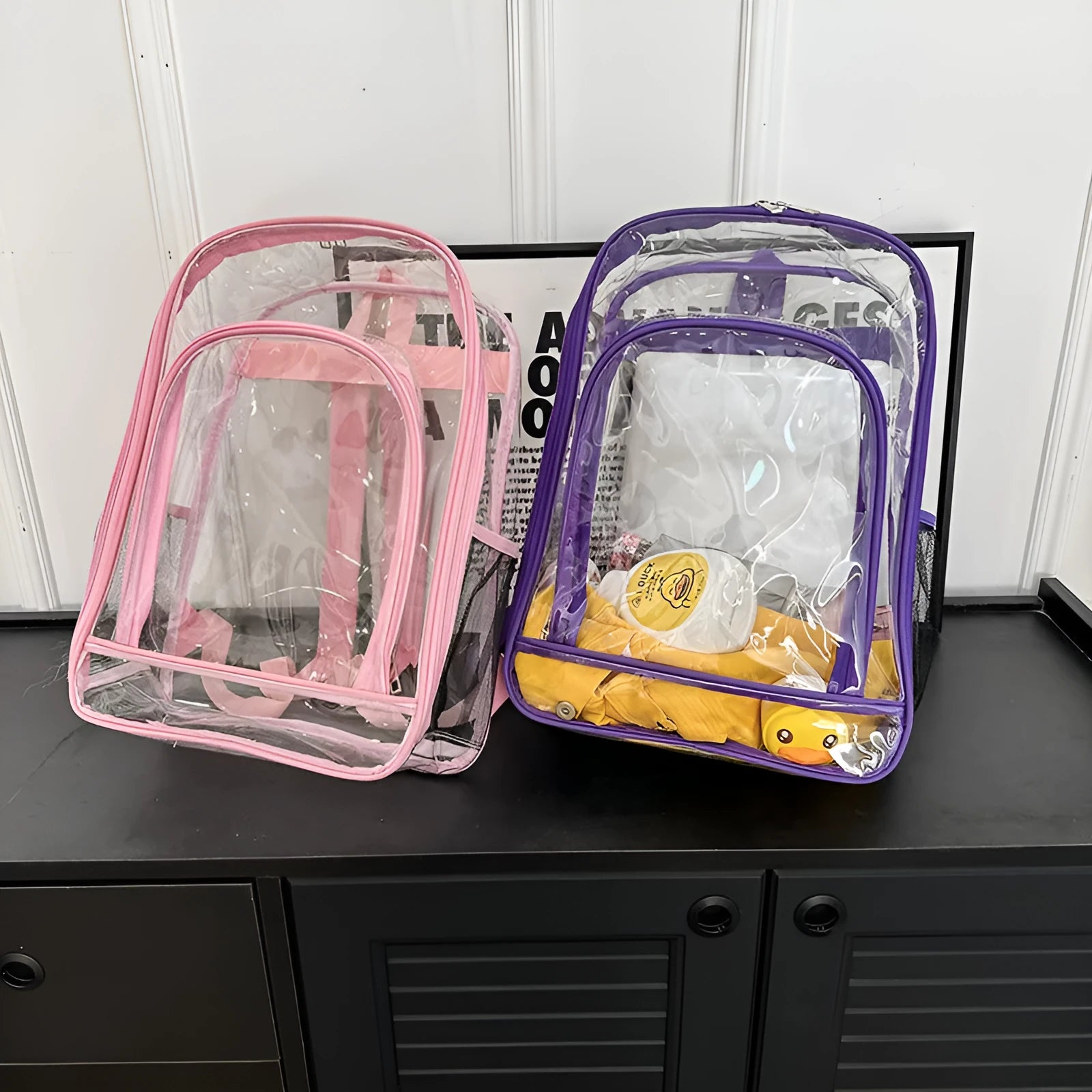 Transparent PVC waterproof backpack with a coloured inner voile bag, shown in various colours.