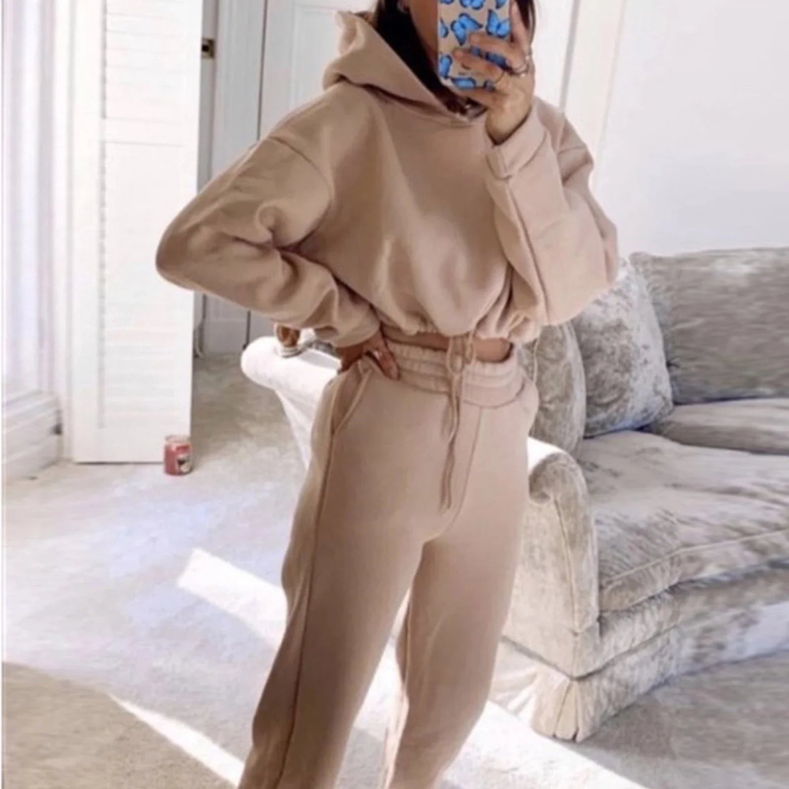 Stylish 2-piece athleisure sets for women in a variety of vibrant colors, including pink, purple, black, blue, and more.