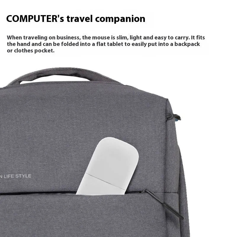 Folding wireless touch mouse showing compact design with Bluetooth connectivity