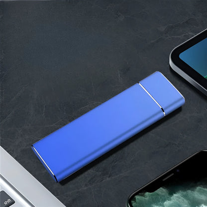 Portable solid state external hard disk with metal shell in sapphire blue colour showing compact dimensions