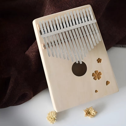 Basswood beginner thumb piano kalimba with no-lacquer finish, available in seven styles including Clouds and Gothic.