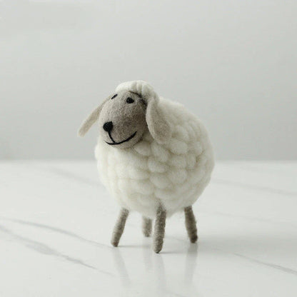 Plush sheep figurines in various colors and sizes, perfect for home decoration and gifting