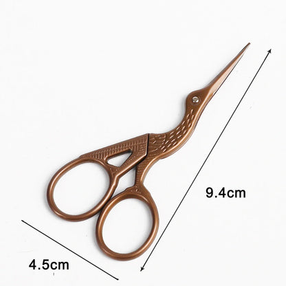 Elegant crane-shaped embroidery scissors crafted from premium stainless steel for precise, effortless cutting