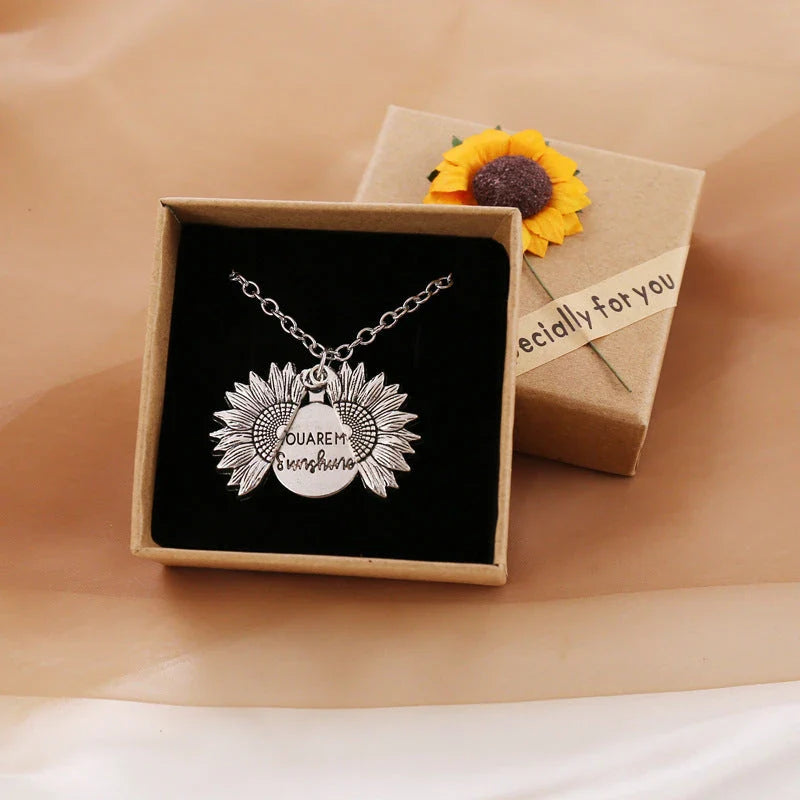 A stunning sunflower pendant necklace with an adjustable chain, crafted from high-quality materials for a radiant and versatile accessory.