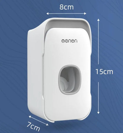 Automatic wall-mounted toothpaste dispenser in blue, grey, and pink colours with LED touch sensor.