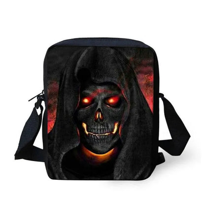 Skull print children's messenger bag with adjustable double straps and zipper closure, shown in a casual setting.