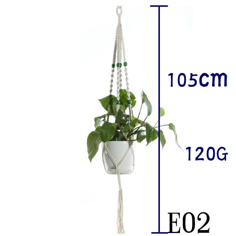 Handmade beige cotton rope net bag holding a plant pot, showing its textured sling design.
