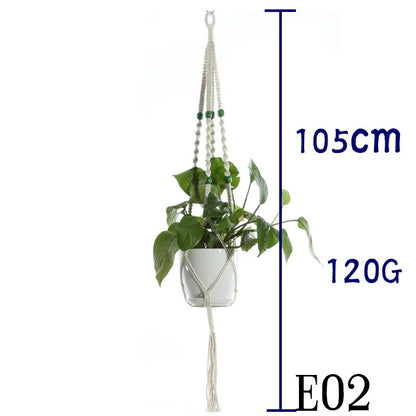 Handmade beige cotton rope net bag holding a plant pot, showing its textured sling design.