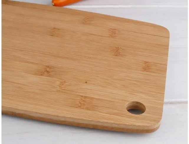 Square Moso bamboo kitchen cutting board with antibacterial protection, 28cm by 17cm