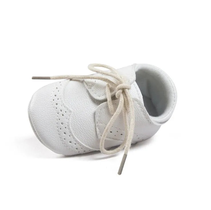 Men's vintage soft-soled baby shoes in synthetic leather, shown in light brown colour