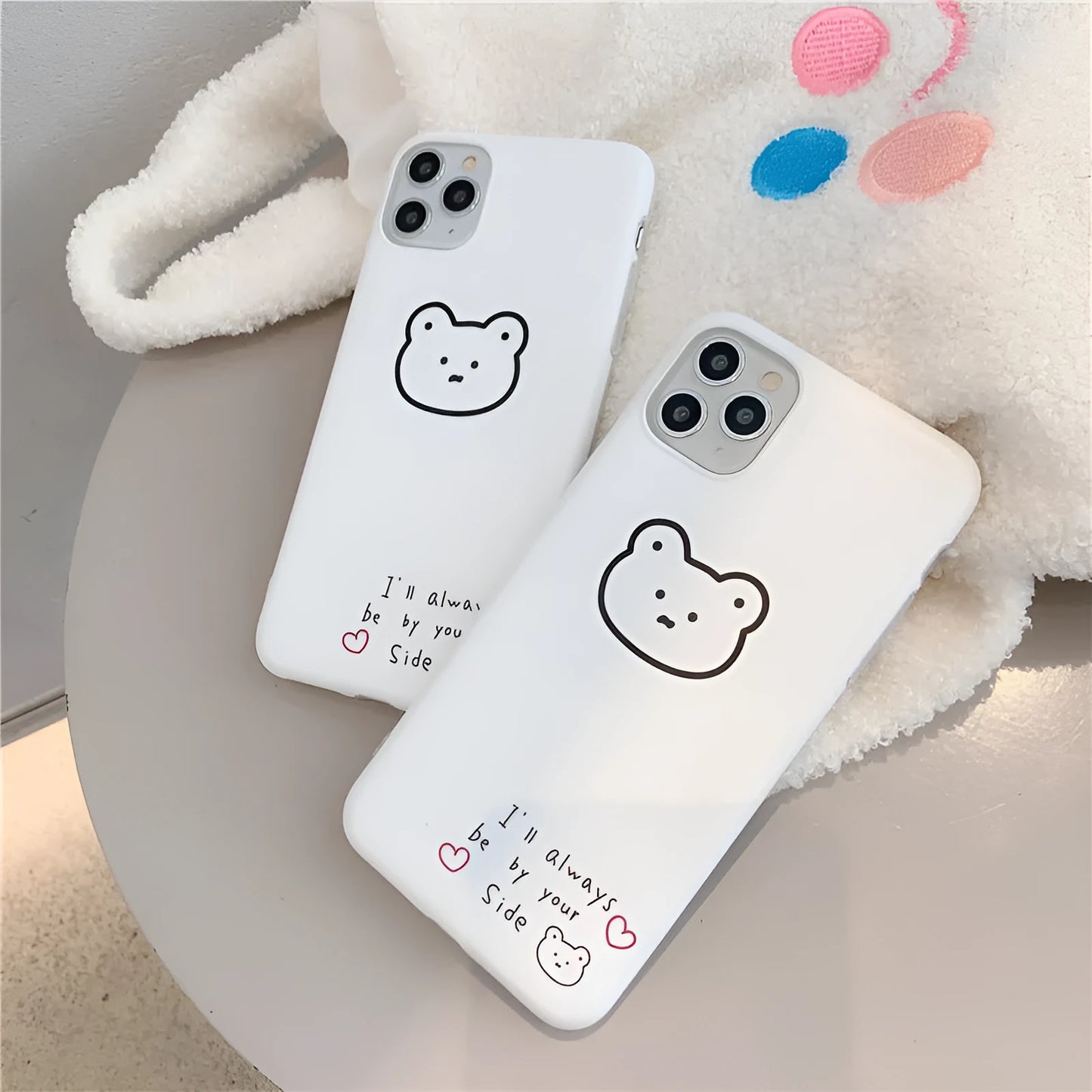 Silicone iPhone case with a Korean cartoon bear design on the back.