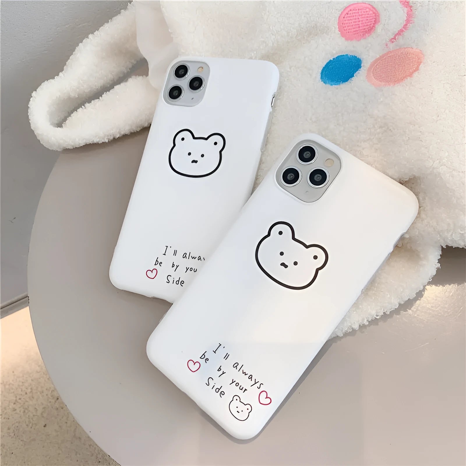 Silicone iPhone case with a Korean cartoon bear design on the back.