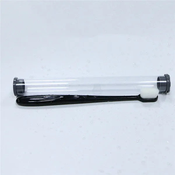 Micron soft toothbrush with coloured handles and different bristle styles including flat head and wavy designs