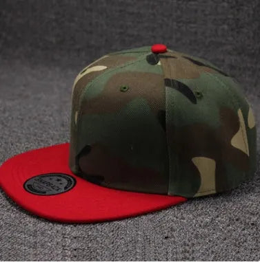 Camo snapback cap with flat brim, cotton polyester, adjustable closure, shown in black, blue, camouflage, and navy blue.