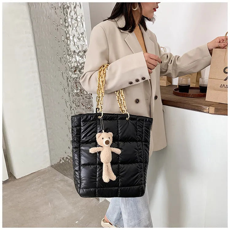 Women's large chain tote shoulder bag in black with 45cm strap, zip fastening and internal pockets