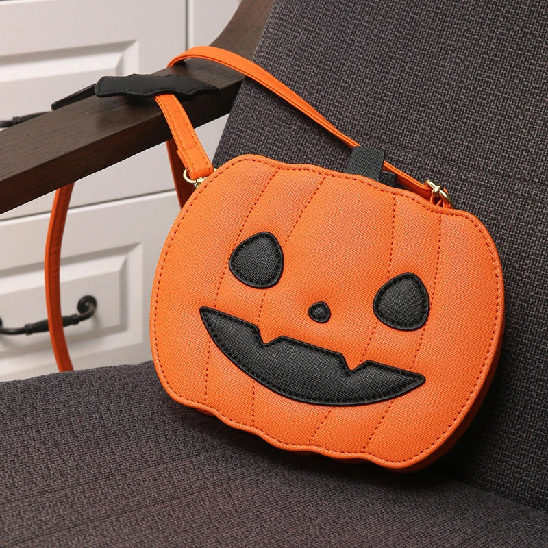 Pumpkin cartoon shoulder bag with adjustable strap and roomy interior, available in various Halloween-inspired colors