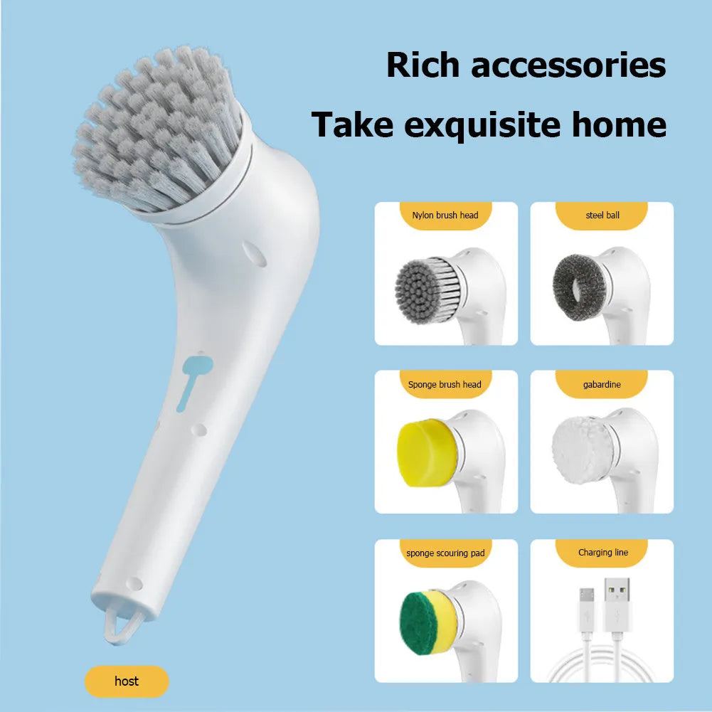 White cordless electric handheld scrubber with five attached brush heads on a kitchen counter
