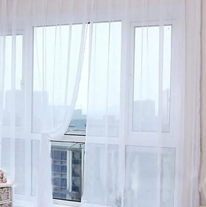 Modern transparent tulle curtains in solid colours with rod pocket hanging system