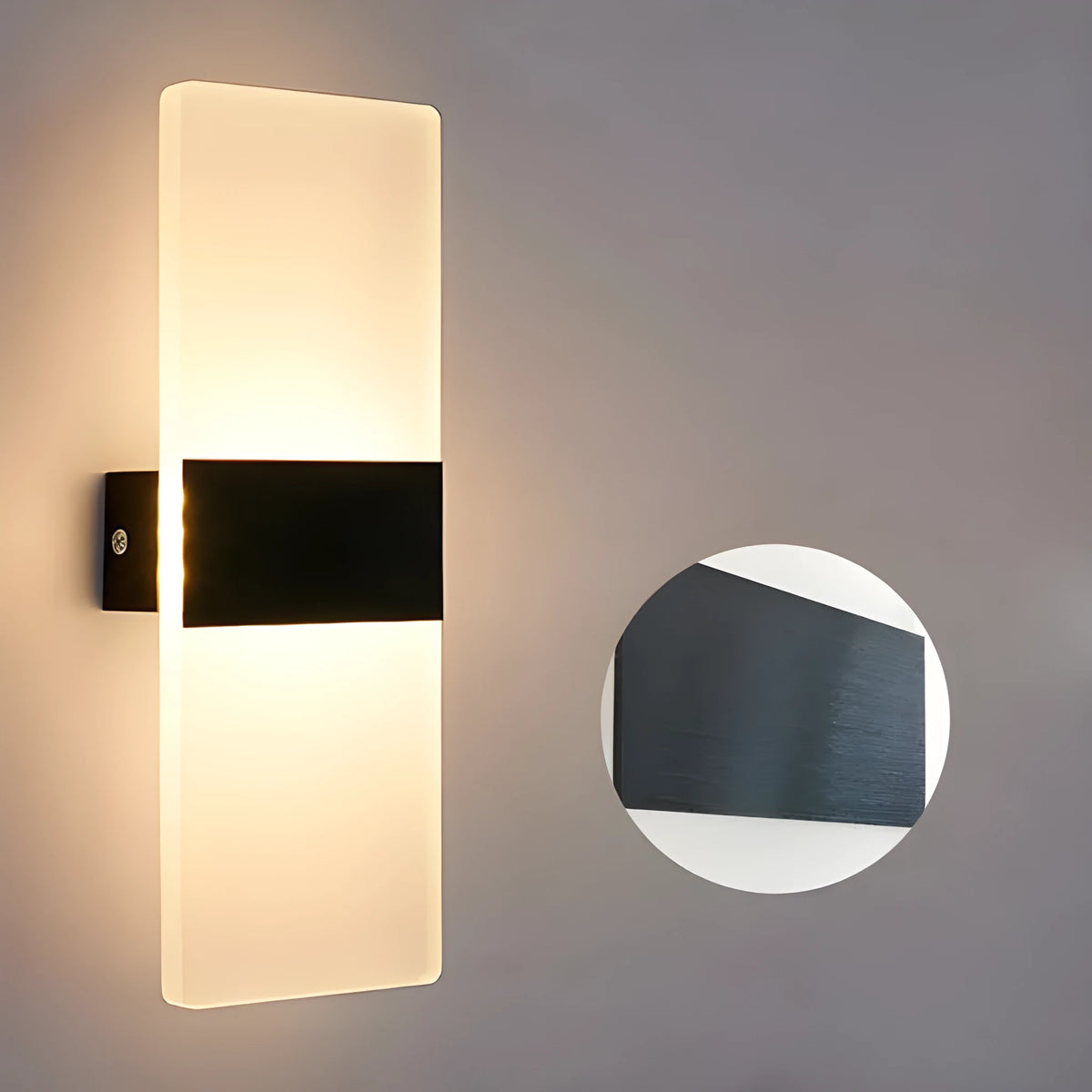 Modern rectangular acrylic LED wall lamp in a choice of black, gold or silver finishes.