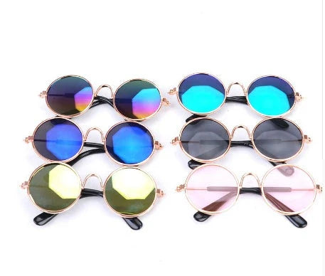 Fashionable cat sunglasses in various colors, including khaki, pink, green, and more. Stylish pet accessories for your furry friend.