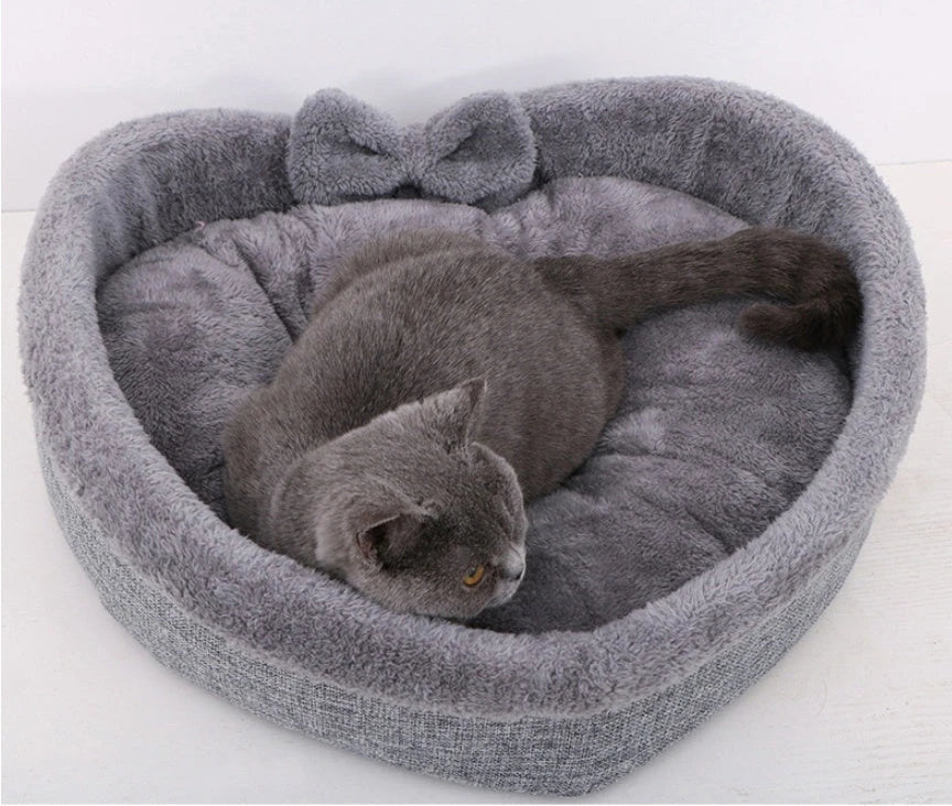 Cozy heart-shaped pet bed in grey and pink colors, suitable for small, medium, and large dogs and cats
