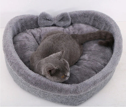 Cozy heart-shaped pet bed in grey and pink colors, suitable for small, medium, and large dogs and cats
