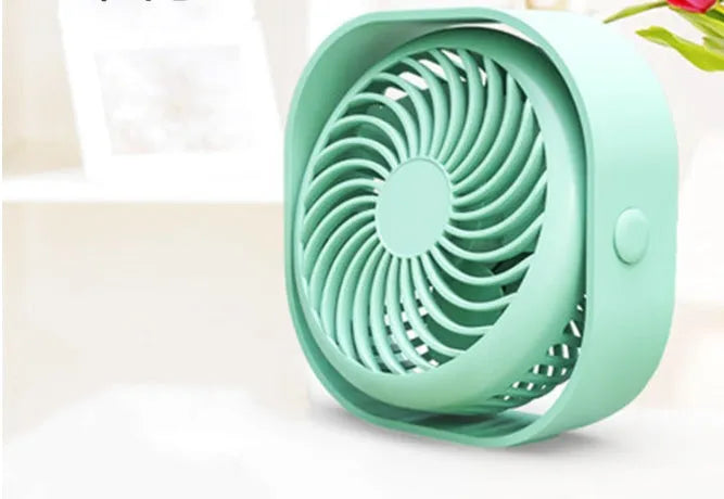USB charging fan with 360-degree rotation and alarm clock display in modern design