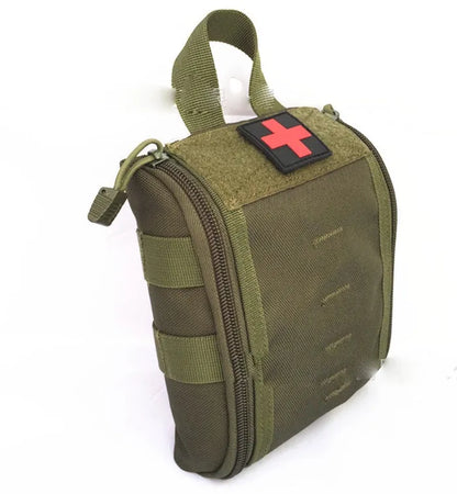 Tactical medical first aid kit open showing gauze, bandages, thermometer, and medicines for outdoor camping.