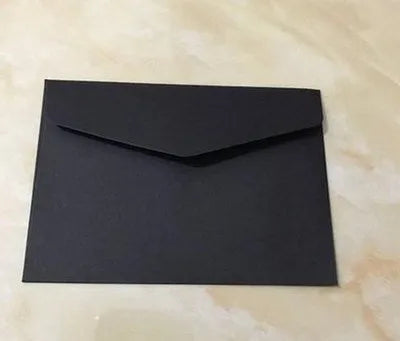 Mini coloured paper envelopes in various hues measuring 11.5 by 8 centimetres