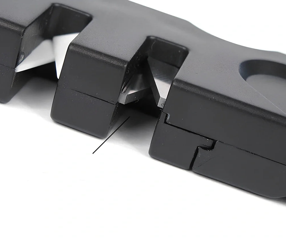 Black Pocket Pal knife sharpener with carbide blades, ceramic slot, and diamond rod, 3-1/2 inches long for hiking use