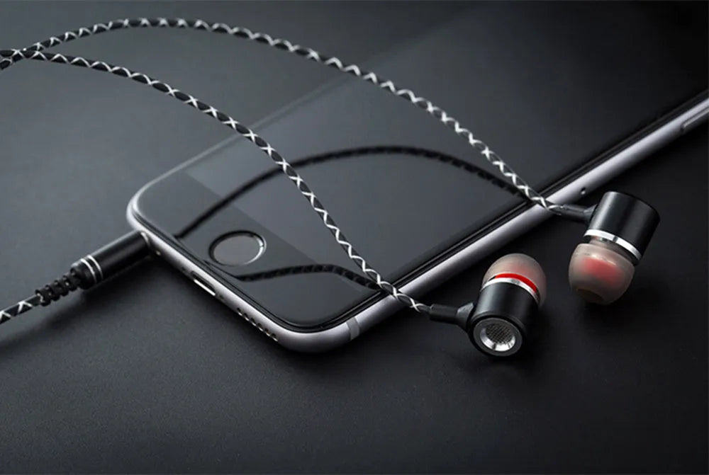 Fanbiya S1 black ear hook earphones with inline microphone and control module on the cable.