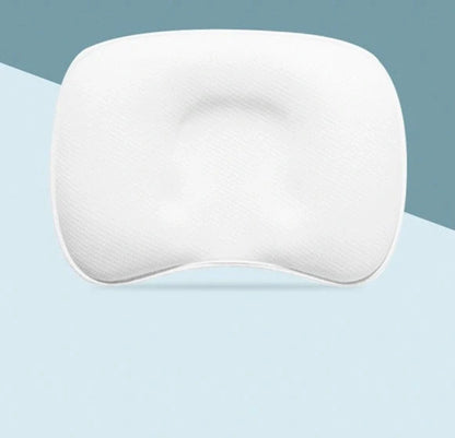 Sunveno Baby Pillow in blue, pink, or white with corn fiber core for head shaping