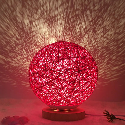 LED rattan table lamp with hand-knit linen shade in various colours