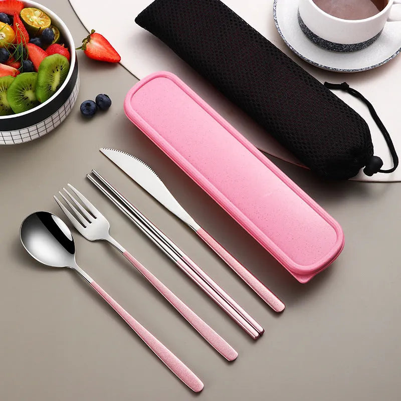 Gold and black stainless steel knife fork spoon set inside a grey mesh carrying bag.