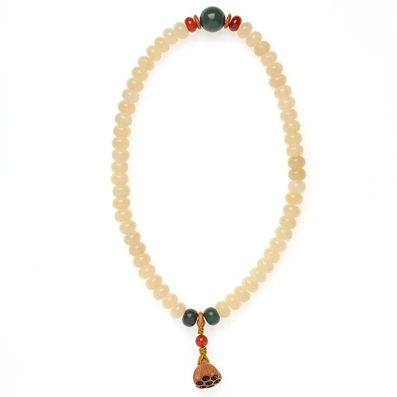 Cream-coloured wooden Bodhi root bracelet with flat round beads on 15-20cm wrist
