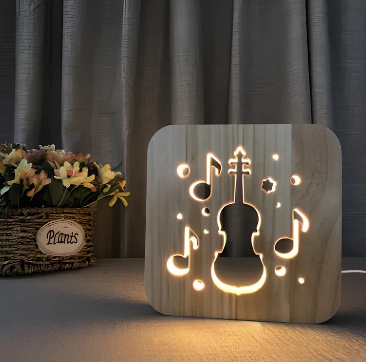 3D wood carving LED night light depicting musical instruments with USB power cable