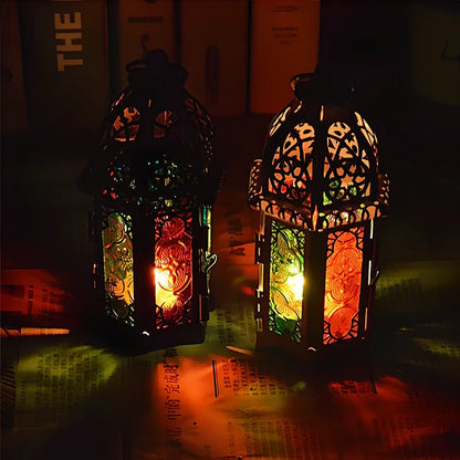 Wrought iron candle holder with 16cm height and 7cm diameter in black finish showing hanging design