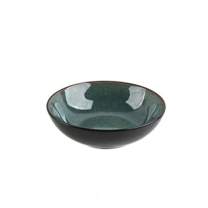 Retro European style porcelain bowls and plates set with round shape on dining table